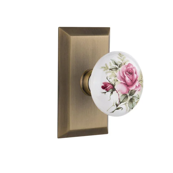 Nostalgic Warehouse 713551 Studio Plate Double Dummy White Rose Porcelain Door Knob, Antique Brass