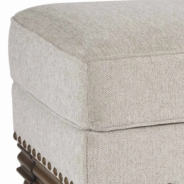 Benjara BM206321 Nailhead Trim Fabric Upholstered Ottoman with Turned Legs Light Gray