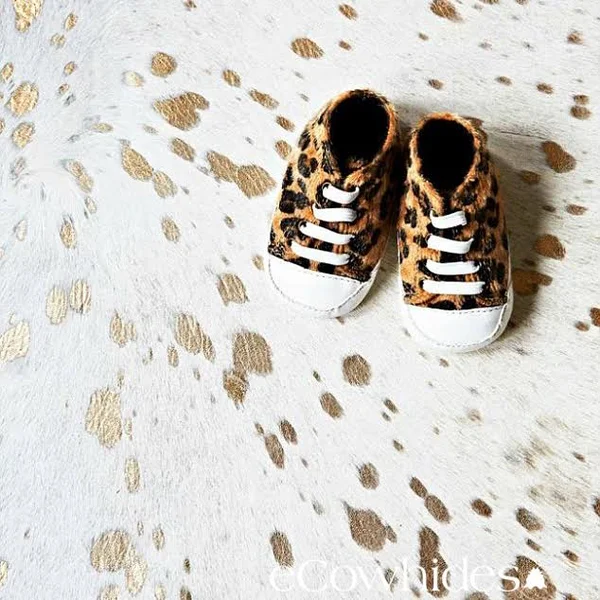 Pergamino Gold on White Cowhide Rug